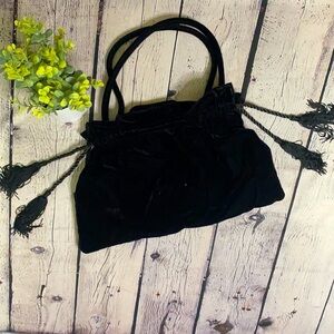 100% manmade material black purse
